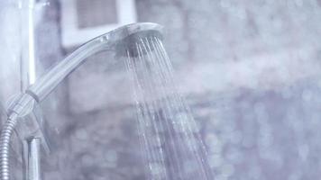 Water flows from the shower head video