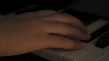 Extreme Close Up of Hand Playing the Piano video