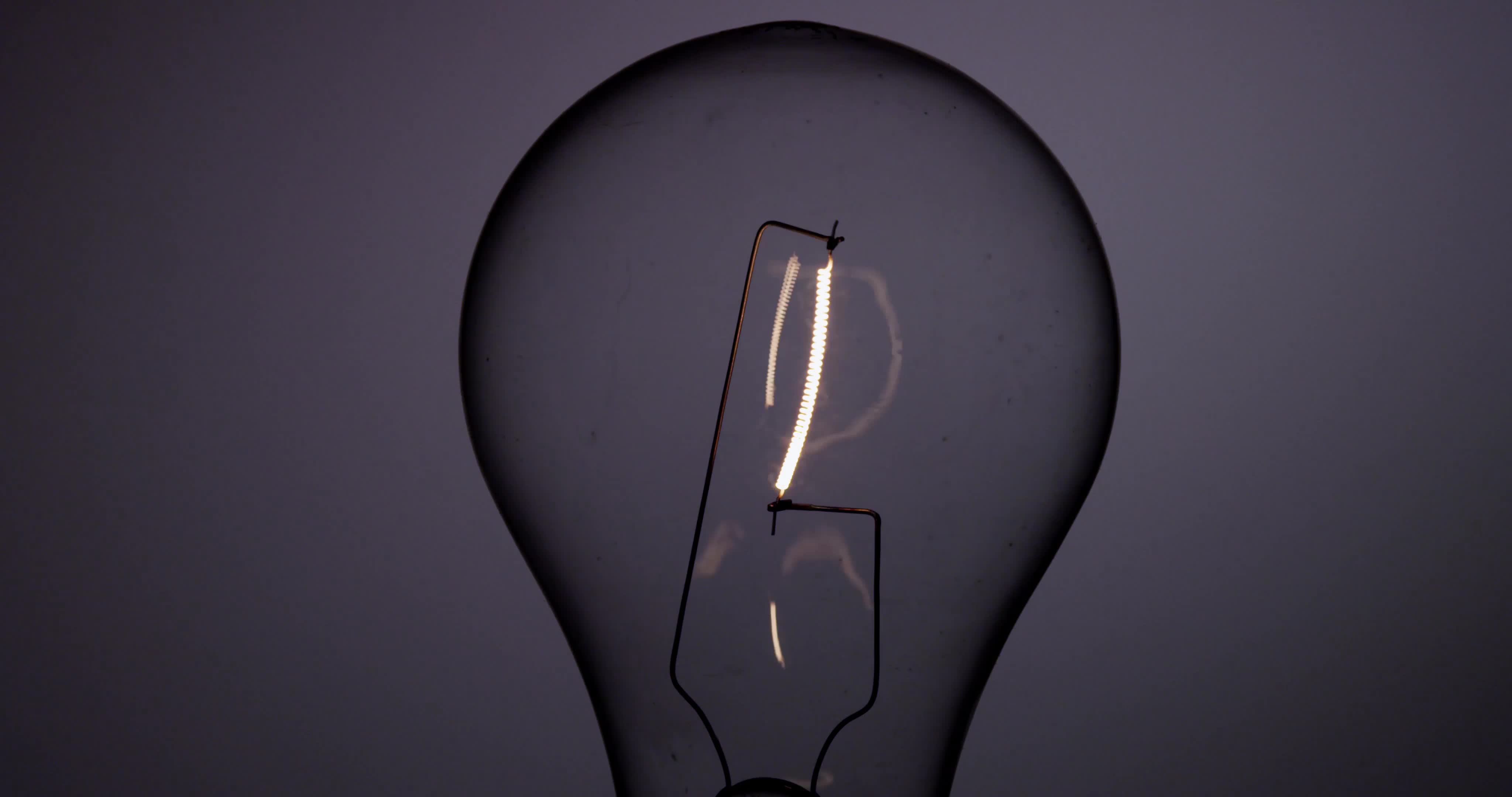 up classic light bulb turning off flickering in 4K Stock Video at Vecteezy