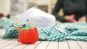 Pin cushion on table at maker studio | Free Stock Footage