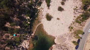 Flying backwards over a river in 4K video