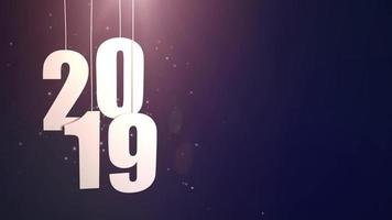 Happy New Year 2019 white paper numbers hanging on strings falling down blue background video
