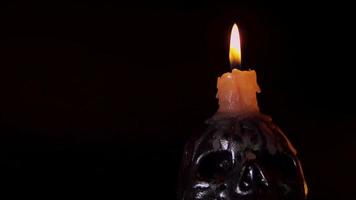 Close Up Of Skull With Candle On Top