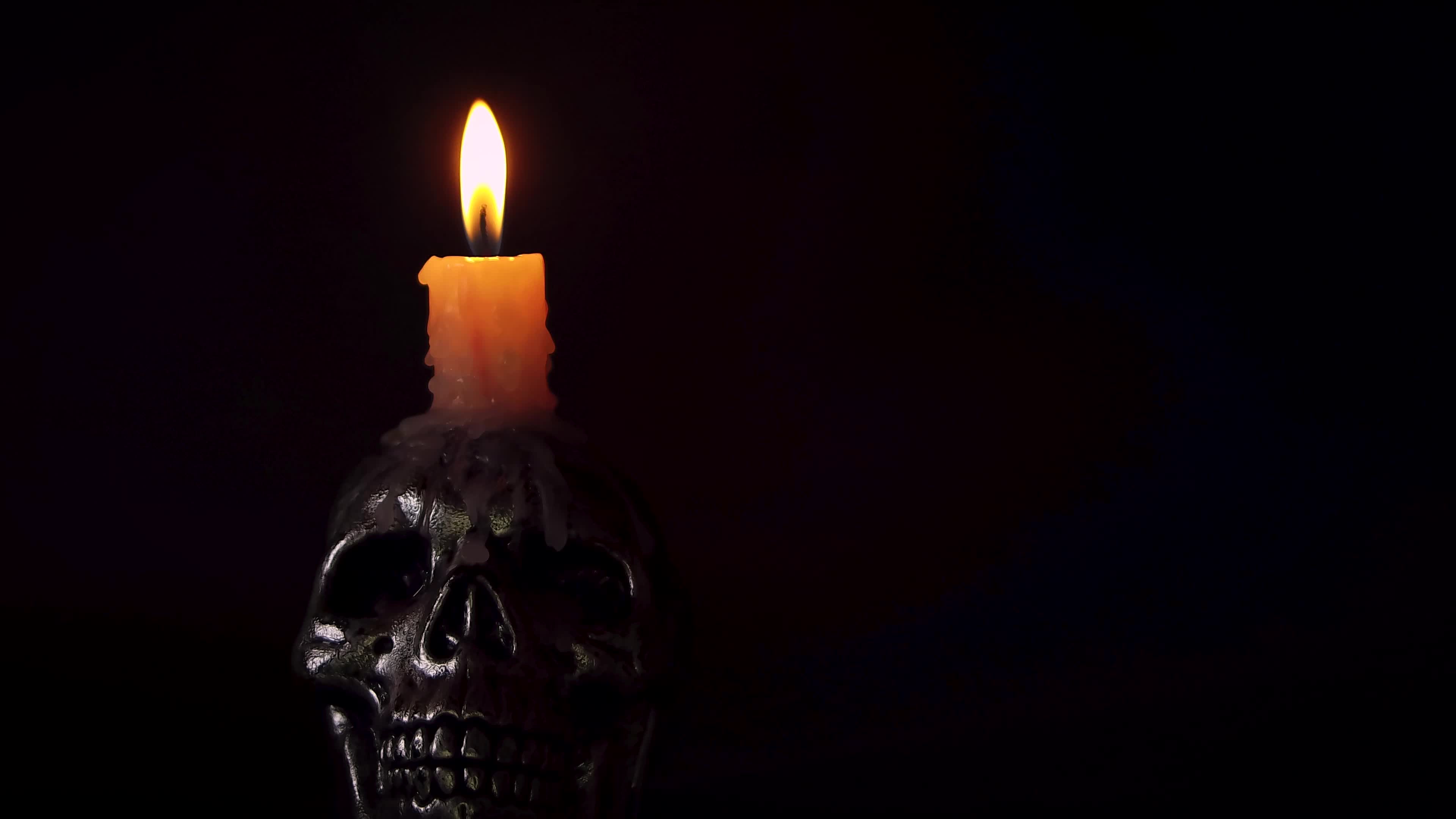 Skull With Candle On Top 1799444 Stock Video at Vecteezy