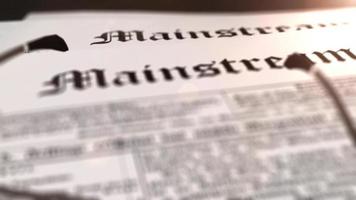 glasses with newspaper with the headline Mainstream on a table video