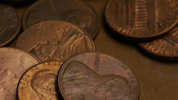 Rotating stock footage shot of American pennies coin - 0.01 - MONEY 0173 video