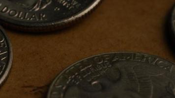 Rotating stock footage shot of American quarters coin - 0.25 - MONEY 0223 video