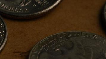 Rotating stock footage shot of American quarters coin - 0.25 - MONEY 0223 video