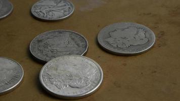 Rotating stock footage shot of antique American coins - MONEY 0050 video