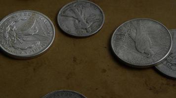 Rotating stock footage shot of antique American coins - MONEY 0069 video