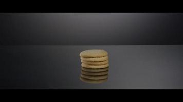 Falling cookies from above onto a reflective surface - COOKIES 186 video
