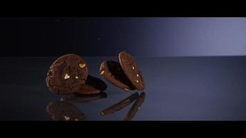 Falling cookies from above onto a reflective surface - COOKIES 201 video