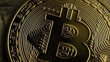 Rotating shot of Bitcoins digital cryptocurrency - BITCOIN 0187 video