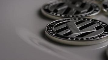 Rotating shot of Litecoin Bitcoins digital cryptocurrency - BITCOIN LITECOIN 0104 video