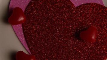 Rotating stock footage shot of Valentines decorations and candies - VALENTINES 0108 video