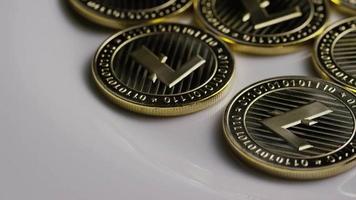 Rotating shot of Litecoin Bitcoins digital cryptocurrency - BITCOIN LITECOIN 0007 video