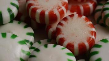 Rotating shot of spearmint hard candies - CANDY SPEARMINT 084 video
