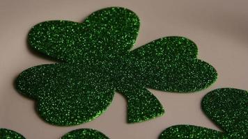 Rotating stock footage shot of St Patty's Day clovers on a white surface - ST PATTYS 009 video