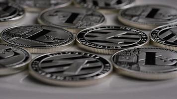 Rotating shot of Litecoin Bitcoins digital cryptocurrency - BITCOIN LITECOIN 0140 video