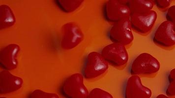 Rotating stock footage shot of Valentines decorations and candies - VALENTINES 0042 video