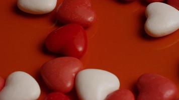 Rotating stock footage shot of Valentines decorations and candies - VALENTINES 0056 video