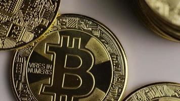 Rotating shot of Bitcoins digital cryptocurrency - BITCOIN 0424 video