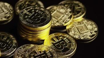 Rotating shot of Bitcoins digital cryptocurrency - BITCOIN 0617 video