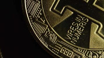 Rotating shot of Bitcoins digital cryptocurrency - BITCOIN 0503 video