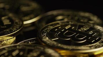 Rotating shot of Bitcoins digital cryptocurrency - BITCOIN 0567 video