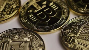 Rotating shot of Bitcoins digital cryptocurrency - BITCOIN 0356 video