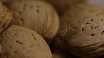 Cinematic, rotating shot of almonds on a white surface - ALMONDS 151 video