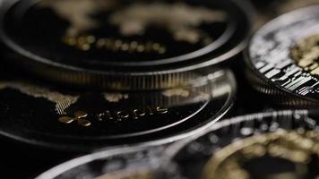 Rotating shot of Bitcoins digital cryptocurrency - BITCOIN RIPPLE 0197 video