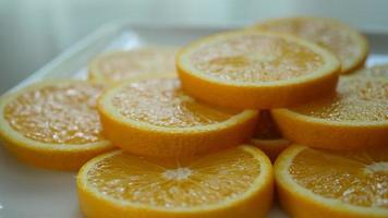 Orange fruit slice in slow motion video