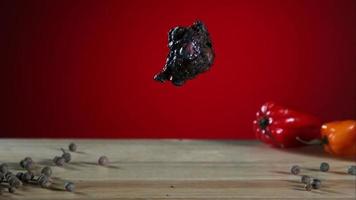 Smoked chicken wings falling and bouncing in ultra slow motion 1,500 fps - CHICKEN WINGS PHANTOM 002 video