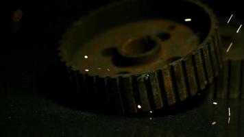 Sparks with gears in ultra slow motion 1,500 fps on a reflective surface - SPARKS w GEARS 026 video