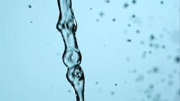 Water pouring and splashing in ultra slow motion 1,500 fps on a reflective surface - WATER POURS 099 video