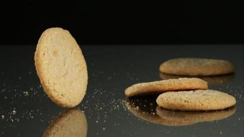 Cookies falling and bouncing in ultra slow motion (1,500 fps) on a reflective surface - COOKIES PHANTOM 056