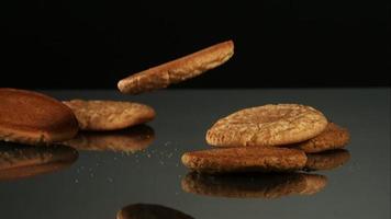 Cookies falling and bouncing in ultra slow motion (1,500 fps) on a reflective surface - COOKIES PHANTOM 113 video