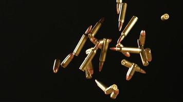 Bullets falling and bouncing in ultra slow motion 1,500 fps on a reflective surface - BULLETS PHANTOM 028 video
