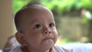 Happy portrait baby boy playing alone  video