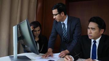 Angry boss dissatisfied with bad com result from employee in office video