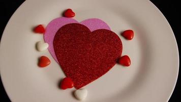 Rotating stock footage shot of Valentines decorations and candies - VALENTINES 0102 video