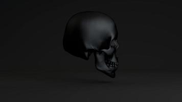 A Spooky Black Skull Rotates and Faces Camera video