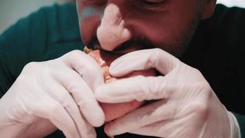 A Bearded Man Eating A Burger video