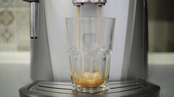 Coffee Machine Serves Coffee into a Glass video