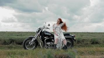 Red-Haired Woman Sitting on a Bike video