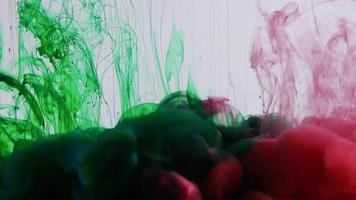 Red And Green Colors Rising in Water video