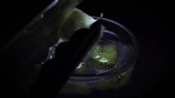 Placing Frozen Kiwi In Ice video