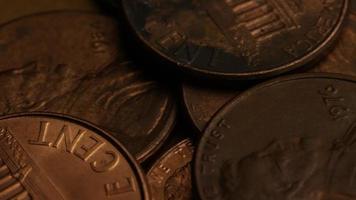 Rotating stock footage shot of American pennies coin - 0.01 - MONEY 0181 video