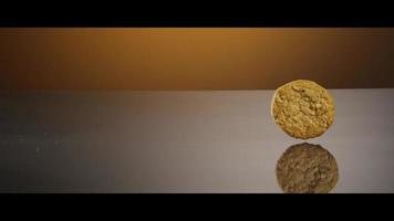 Falling cookies from above onto a reflective surface - COOKIES 215 video